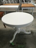 Tavolo rotondo in arte povera con gamba centrale - Marca design